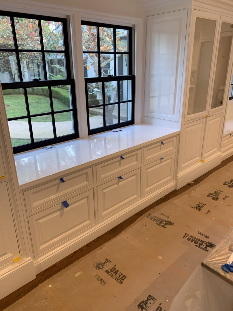 Primed white built-in cabinets