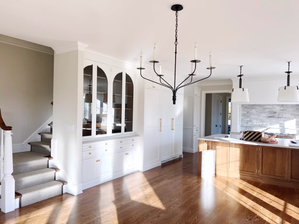 White painted built-in cabinets in a dining room