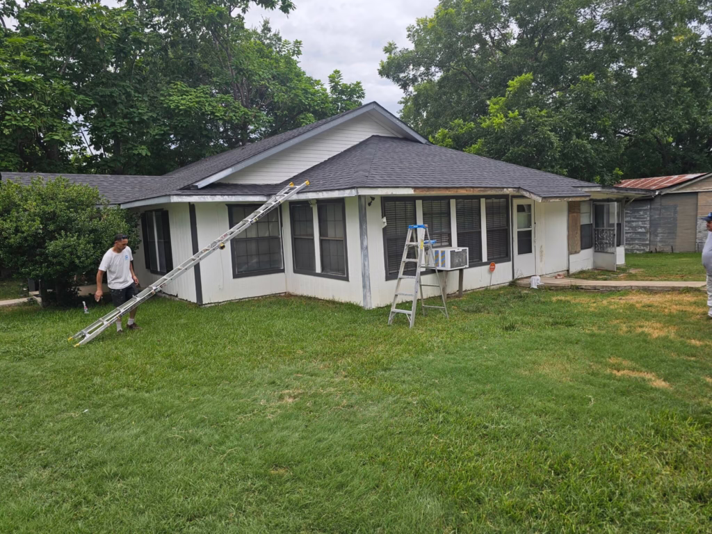 Ladders set up for exterior house painting